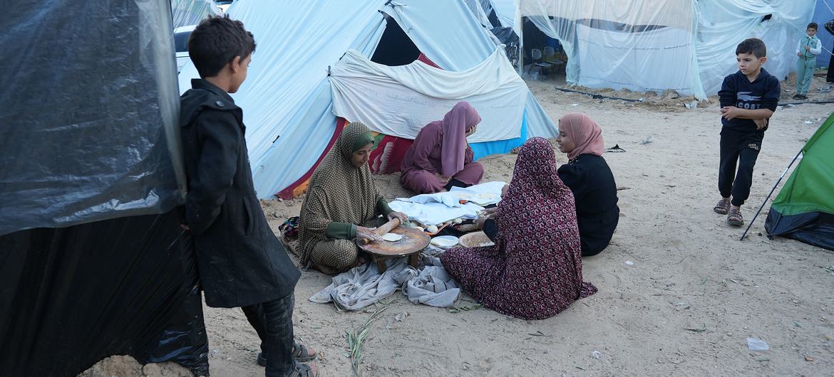Internally displaced people rest at a camp near the Nasser Hospital in Khan Yunis, in the south of Gaza.