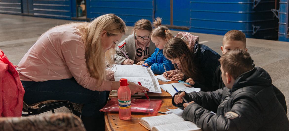Children study in a shelter in Kharkiv metro in Ukraine.