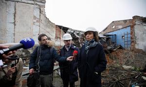 UNESCO Director-General Audrey Azoulay is interviewed by the media during her visit to Ukraine.