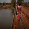A woman crosses a bridge in Bambari, in the Central African Republic.