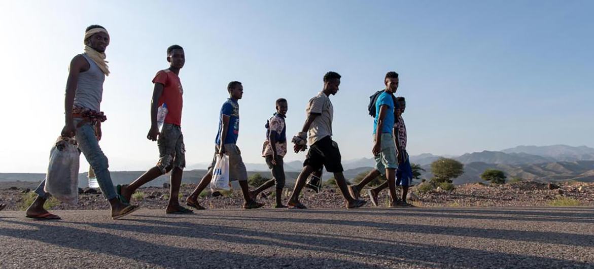 A group of young migrant men on the move in eastern Africa.