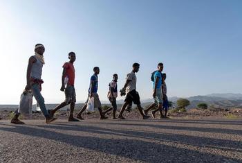 A group of young migrant men on the move in eastern Africa.