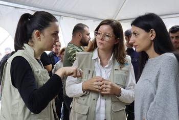 UNICEF Representative Christine Weigand (centre) and Human Rights Defender of Armenia Anahit Manasyan visit the humanitarian station based in Kornidzor where tens of thousands of ethnic Armenian refugee children and their families have been arriving.