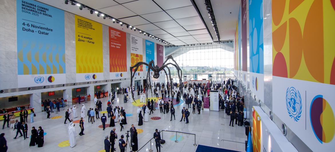 Participants at the World Summit in the "Spider" foyer of the Qatar National Convention Centre.