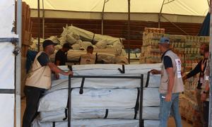 UN partner BLDA distributes tents to Gaza families after the ceasefire began on 10 October. The enclave remains in the grip of a catastrophic humanitarian emergency..
