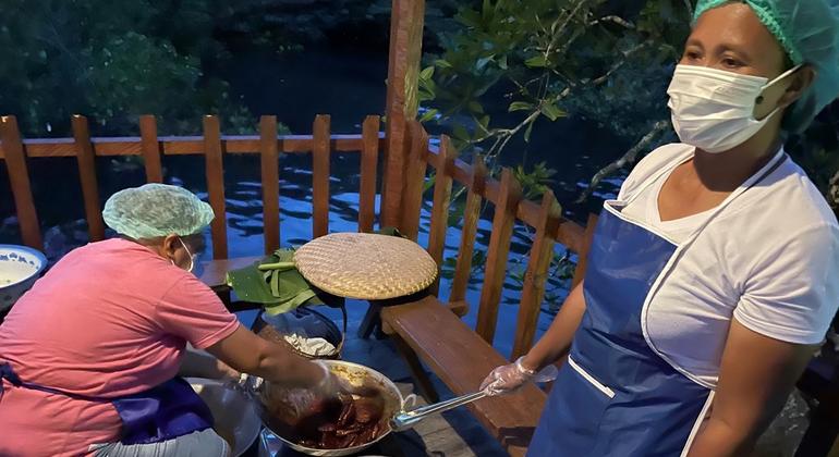 Members of the Budo tourist association prepare local delicacies for tourists.