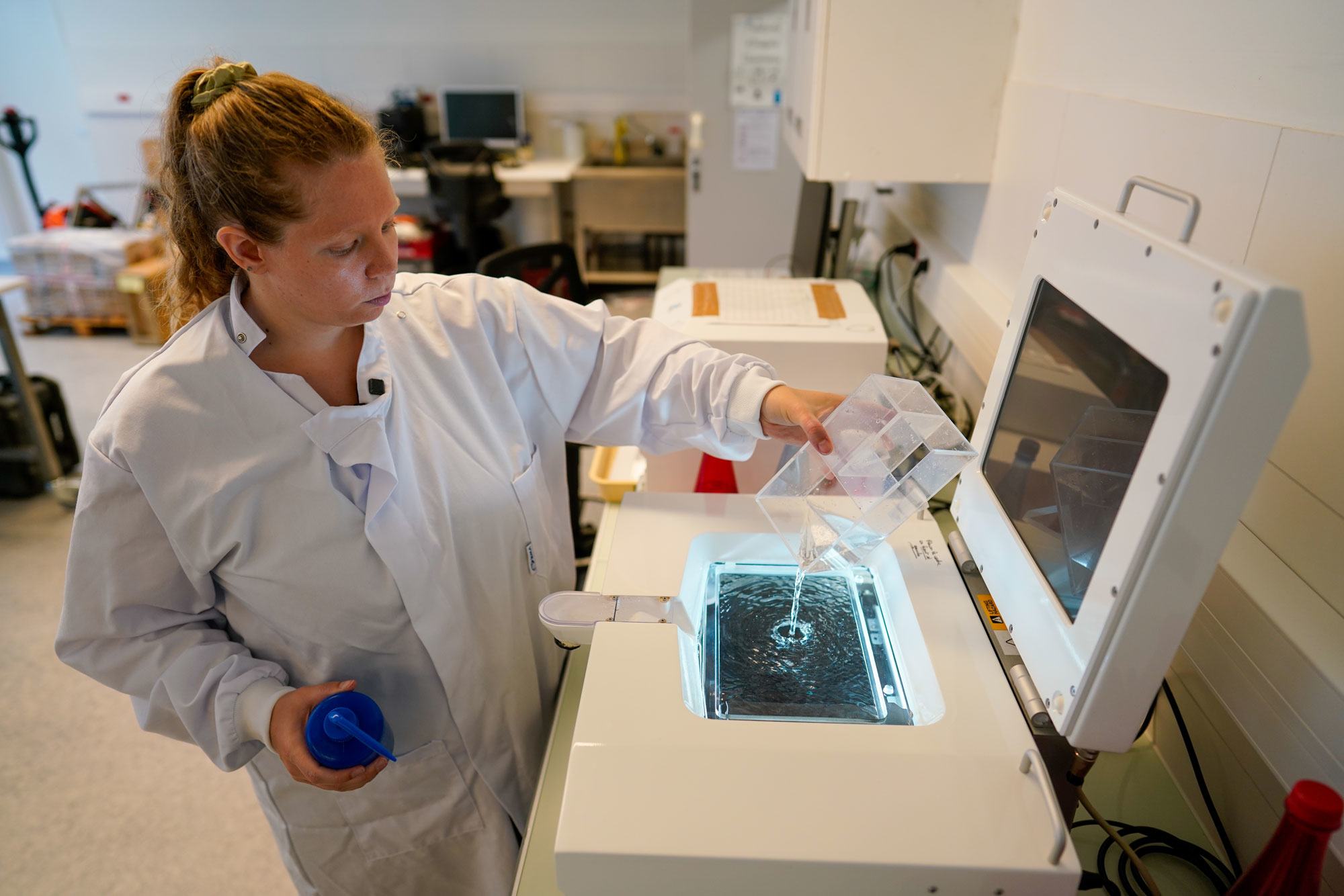 Anthéa Bourhis, 28, a lab technician at the Villefranche Oceanography Lab, known as LOV, pours the morning's catch into a scanning machine to produce a digital image of the zooplankton. Anthéa Bourhis, 28, a lab technician at the Villefranche Oceanography Lab, known as LOV, pours the morning's catch into a scanning machine to produce a digital image of the zooplankton.
