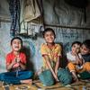 Rohingya children living in a refugee camp in Cox’s Bazar, Bangladesh enjoy a lighter moment. 