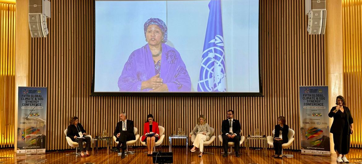 Amina Mohammed (on screen), United Nations Under-Secretary-General, speaks at the 5th Global Conference on Synergies between Global Climate and the Sustainable Development Goals (SDGs) in Rio de Janeiro, Brazil.