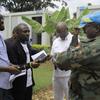 Brigedia Jenerali Alfred Matambo wa MONUSCO FIB akizungumza na George Musubao wa Habari za UN Kiswahili wakati wa mahojiano nje ya jengo la makontena nchini DRC.