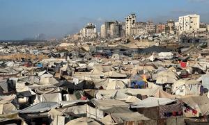 Displaced persons' tents crowded along the coastal strip of Gaza City in the northern part of the Gaza Strip.
