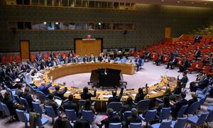 UN Security Council members vote on a resolution to remove sanctions from Syria's interim President