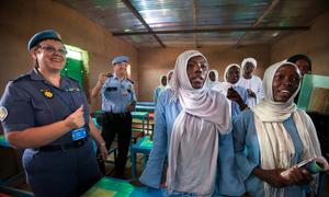 Commissioner Paneras celebrates the opening of two new classrooms for a secondary school for displaced girls living at the Zam Zam camp in North Darfur.