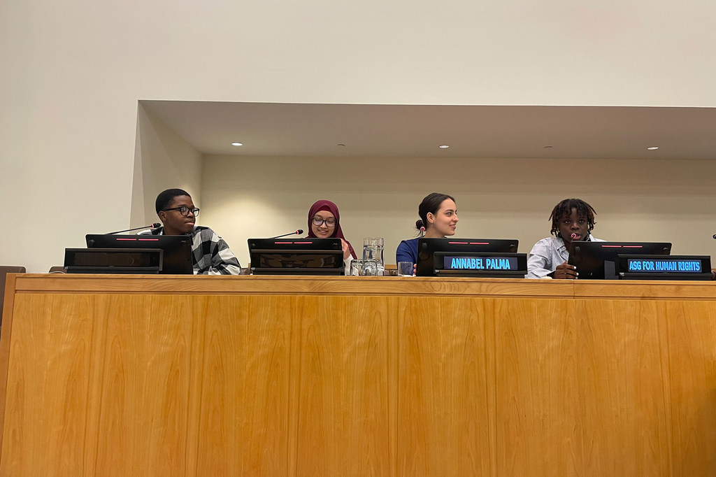 Youth representatives (left to right) Kennedy Iwule, Tabassum Rahman, Elinor Hershkowitz, Jahzara Wilson, take part in a human rights event. 