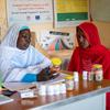 सूडान में एक महिला अपनी गर्भ स्वास्थ्य जाँच कराते हुए.