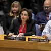 联合国妇女署执行主任巴胡斯（桌边靠左）在安理会有关妇女、和平与安全的部长级会议上发言。