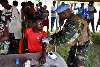 UN peacekeepers from Tanzania’s Quick Reaction Force in the Democratic Republic of the Congo (DRC) diagnose non-communicable diseases (NCDs) for residents of Nzuma village in the North Kivu province territory of Beni during World Health Day.