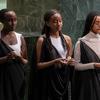 Participants light candles during the commemoration of the 31st anniversary of the 1994 Genocide against the Tutsi in Rwanda