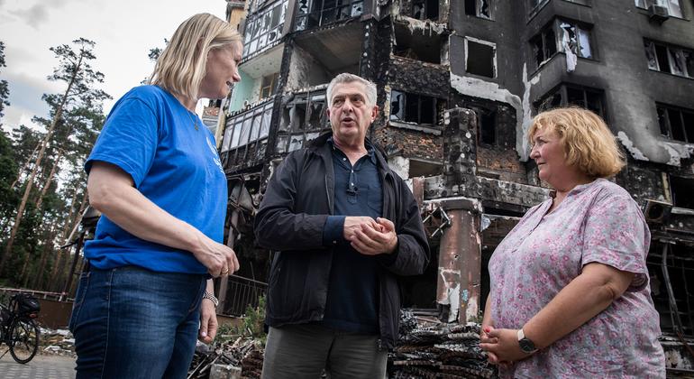 High Commissioner for Refugees, Filippo Grandi (centre) visits a neighbourhood in Irpin, Ukraine, where 1,000 buildings were damaged, and 115 completely destroyed.