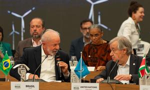 UN Secretary-General António Guterres (right) joins a discussion on energy transition in Belém, Brazil.