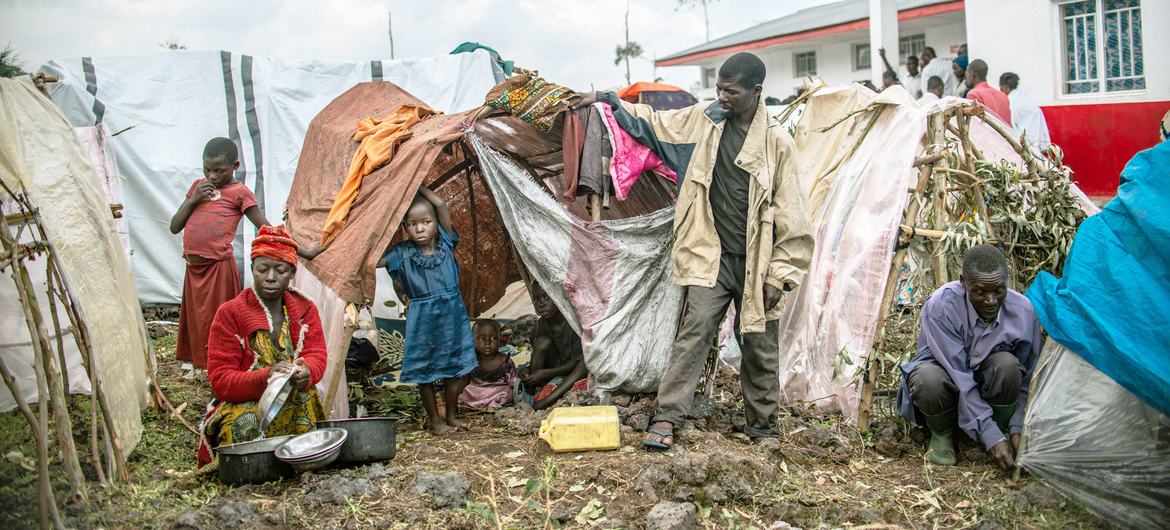 Nyiranzaba and her 9 children take shelter in a tent after fleeing her village in Rutshuru territory, North Kivu province, DR Congo.