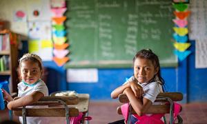 Two young girls attend class in the  mountainous and impoverished area of Jinotega, Nicaragua.