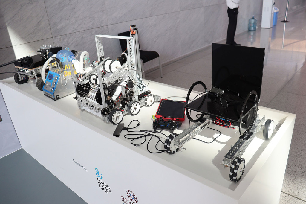 The robots by The Afghanistan Girls Robotic Team are among the displays that attract many at Least Developed Countries Conference in Doha, Qatar.