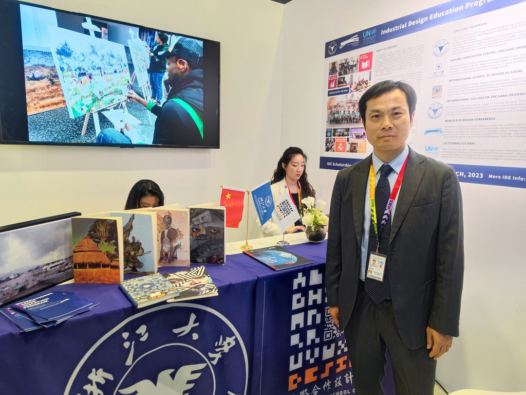 Professor Shijian Luo, Dean of the International School of Design, Ningbo Innovation Centre, Zhejiang University, at an education-related exhibit during the LDC5 Conference in Doha, Qatar.