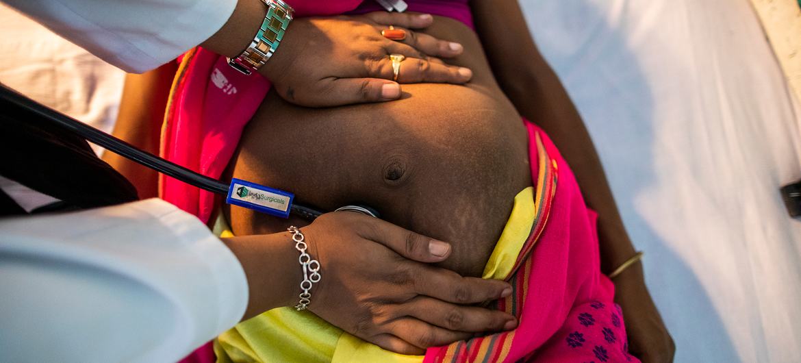 A pregnant woman has a prenatal check-up at a hospital in Muttuck, India.