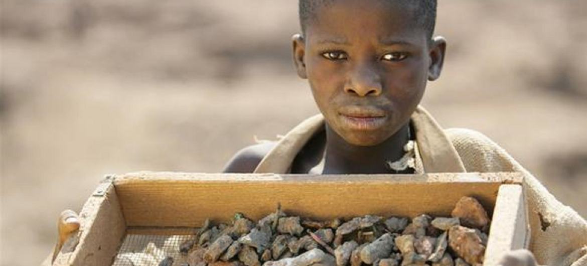 A boy mines for copper mine in the town of Kipushi in southeastern Democratic Republic of the Congo.