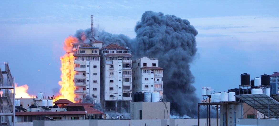 A building is engulfed in flames in central Gaza.