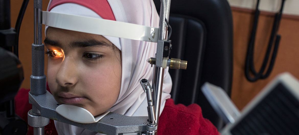 A patient at risk of diabetes receives a special eye exam at the National Centre for Diabetes in Amman, Jordan.