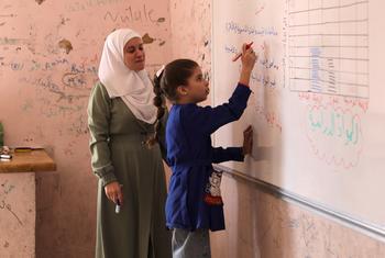 A nine-year-old girl attends a school repaired by UNCEF in rural Aleppo, which sustained significant damage during the conflict.