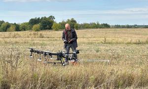 A Ukrainian developer prepares to present new technology for humanitarian mine action. UNDP Ukraine, in collaboration with the Ministry of Economy and the Kyiv School of Economics, are testing a range of robotic technologies.