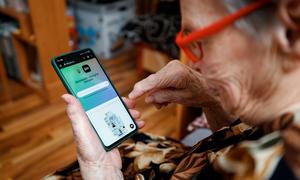 An elderly woman uses the Ukrainian digital platform Diia, which is aptly described as “the state in a smartphone”. UNDP in Ukraine supports Diia and helps older people to strengthen their digital skills.