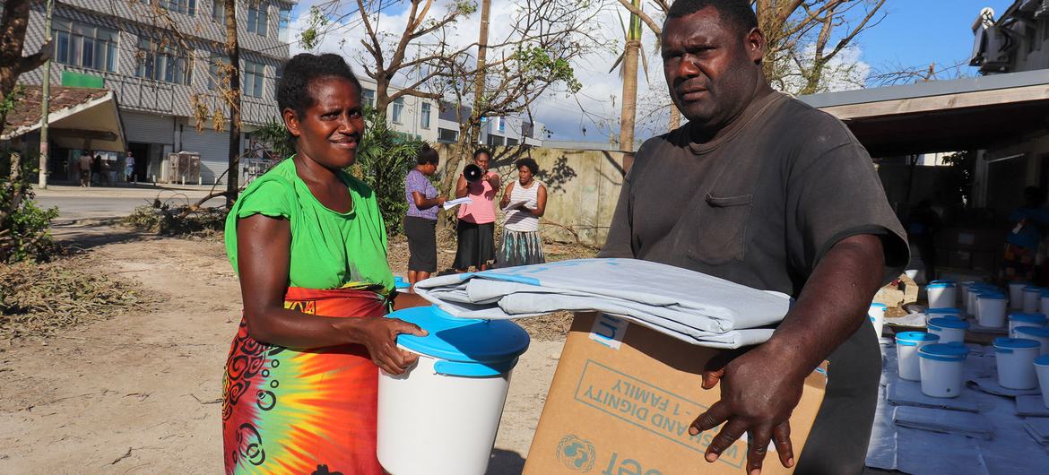 Emergency supplies are delivered to people at an evacuation centre in Shefa Province in Vanuatu after Tropical cyclones Kevin and Judy left a trail of destruction across the country.