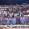 Des écoliers et des officiels participent à une cérémonie commémorative du génocide des Tutsis au Rwanda, à New Delhi.