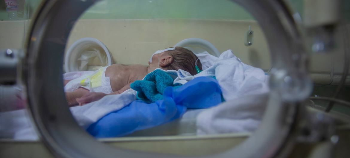 A premature baby, who has been in an incubator for almost a month, is monitored closely at a hospital in Iraq.