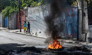 People walk through Turgeau district, one of the neighbourhoods of Haiti's capital, Port-au-Prince, most affected by gang violence.
