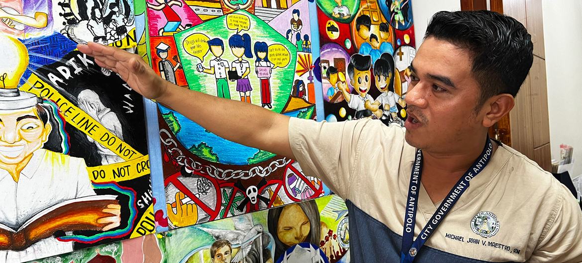 Michael John Maestro shows drug-abuse prevention illustrations by local students.
