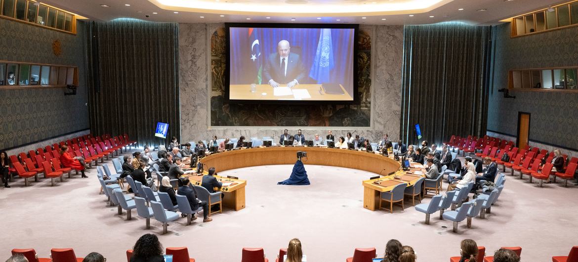 Karim Khan (on screen), Prosecutor of the International Criminal Court (ICC), briefs the UN Security Council meeting on the situation in Libya.