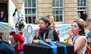 In Glasgow, Scotland, people take part in a Fridays for Future demonstration for climate action, led by youth climate activists and organized on the sidelines of the 2021 UN Climate Change Conference (COP26).