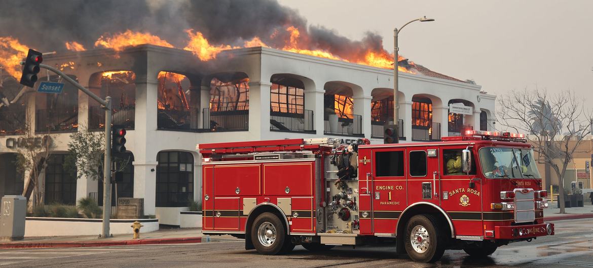 A bank building burns in Los Angeles, California.