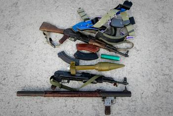 Weapons seized from suspected members of the Islamic insurgent group Al Shabaab are put on show in Mogadishu, Somalia.