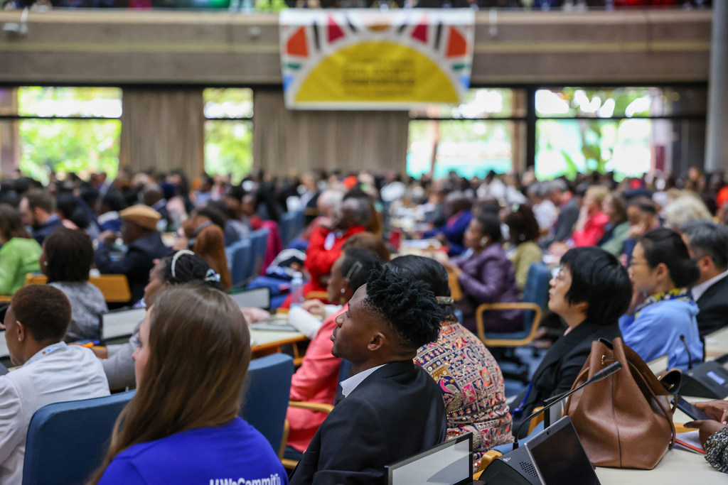 Attendees at the UN Civil Society Conference in Nairobi, Kenya, listening to addresses by the speakers.