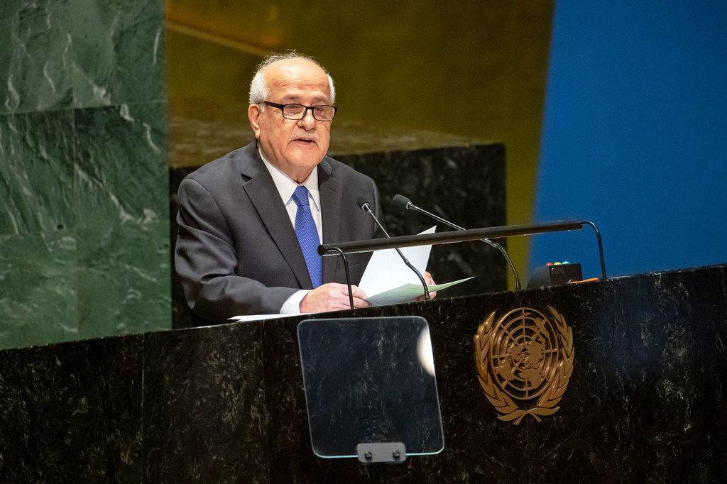 Riyad Mansour, Permanent Observer of the State of Palestine, addresses the United Nations General Assembly from a podium.
