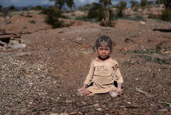 A young girl with  polio works in a mine in Anosy, Madagascar.