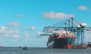 A container ship docks in Vietnam.