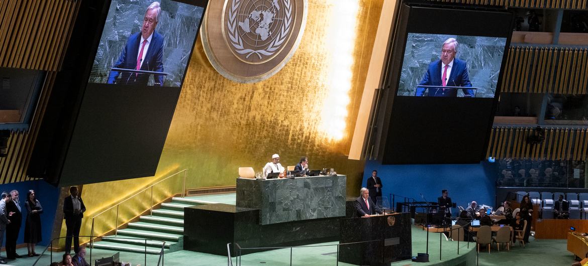 Secretary-General António Guterres (at podium and on screens) addresses the first plenary meeting of the 79th session of the General Assembly.