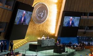 Secretary-General António Guterres (at podium and on screens) addresses the first plenary meeting of the 79th session of the General Assembly.